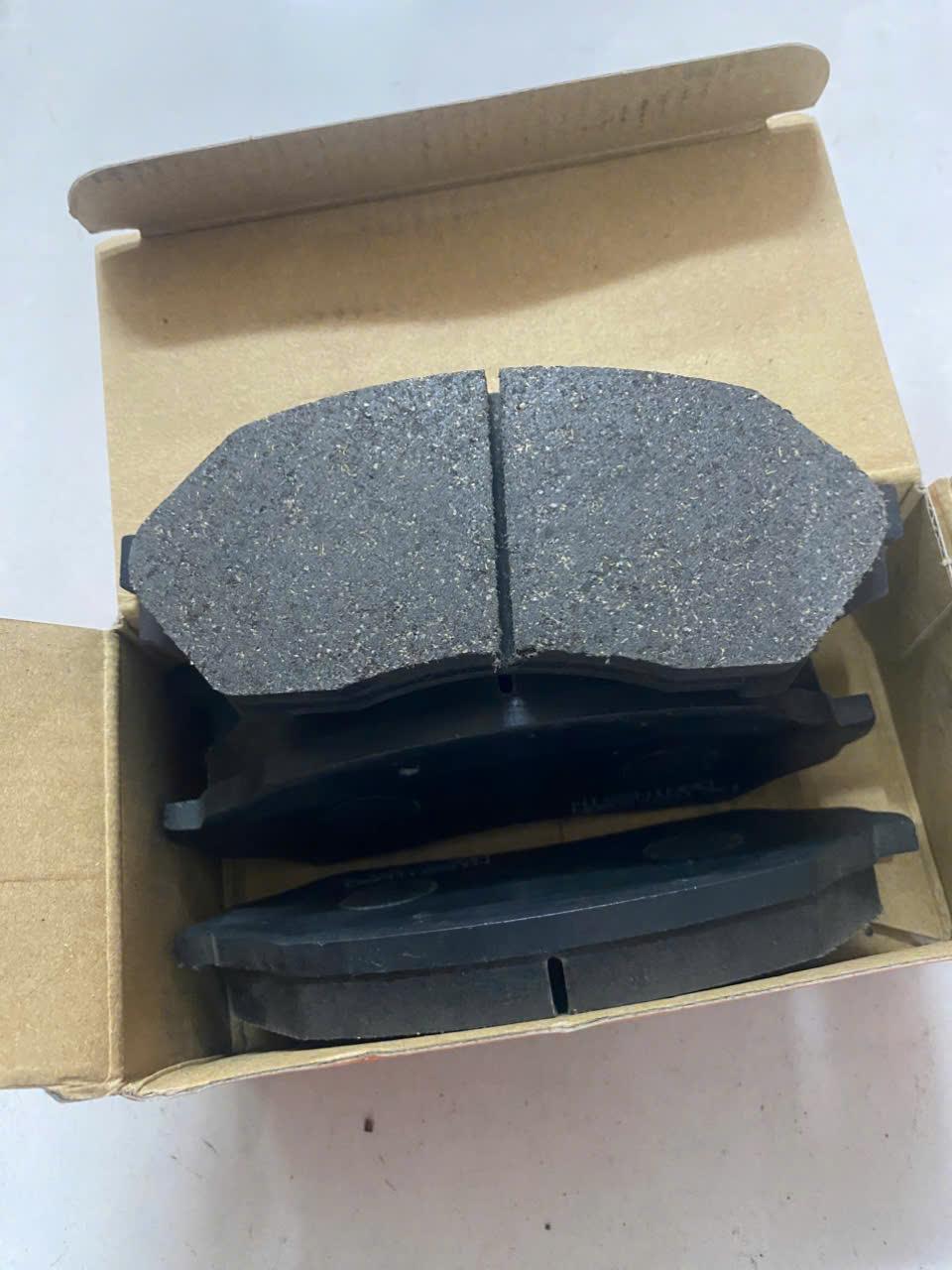 Má phanh trước Ford laser 1.6 TH (sau càng)