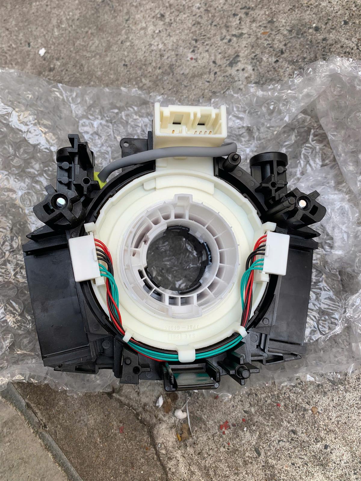 Cáp xoắn vô lăng Nissan Navara 2.2 2005-2013 CH( cuộn kèn)